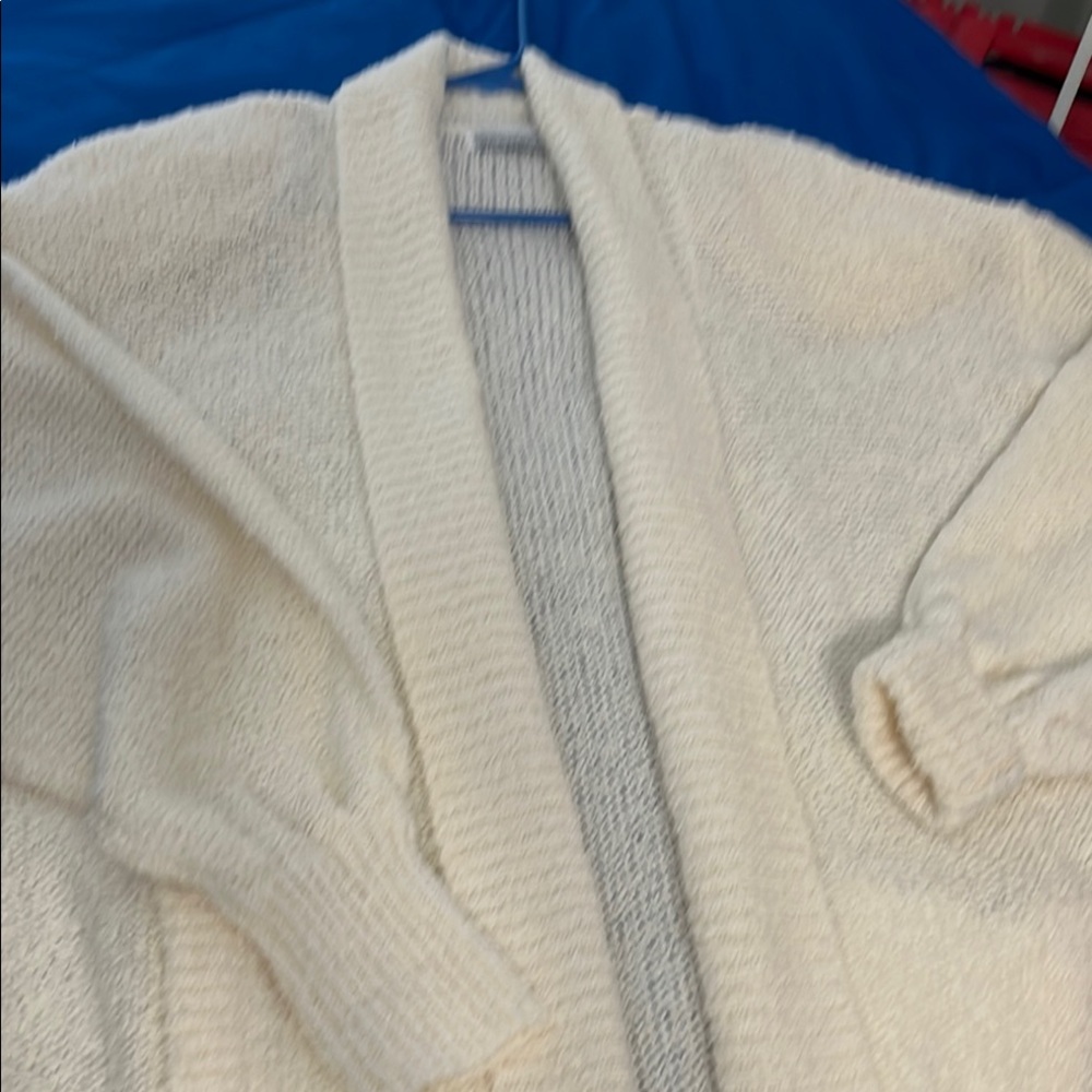 Cream Cardigan with Soft Knit Texture and Zipper Front